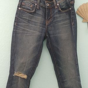 Distressed Baldwin blue jeans